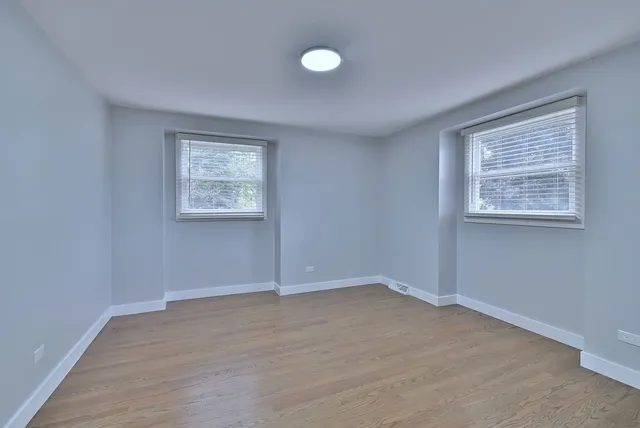 an empty room with windows