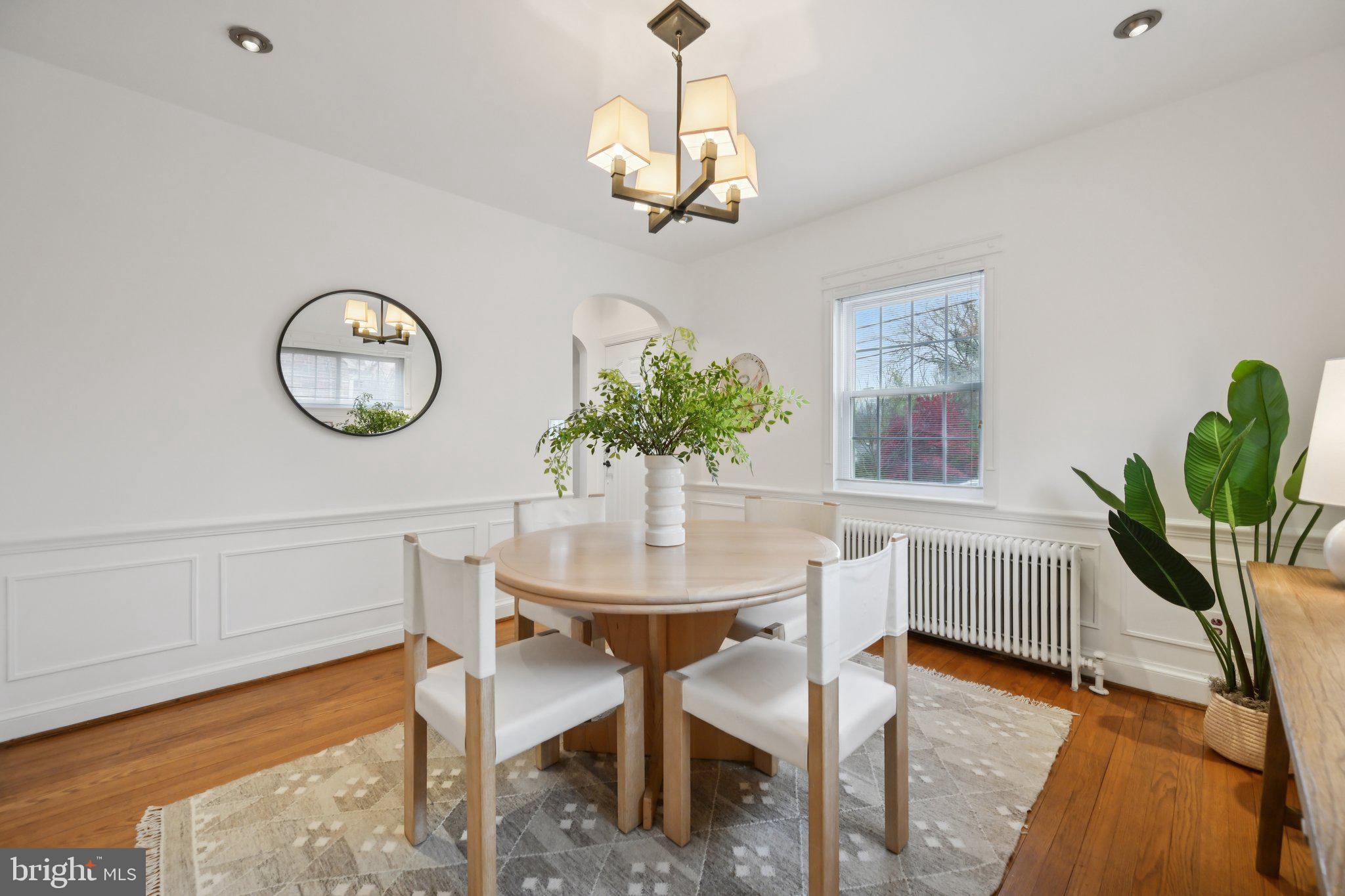 9405 Garwood Street Silver Spring, MD 20901 - Photo 14 of 38 Overhead Lighting & Hardwood Floors