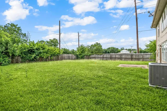 a view of a lake with a big yard