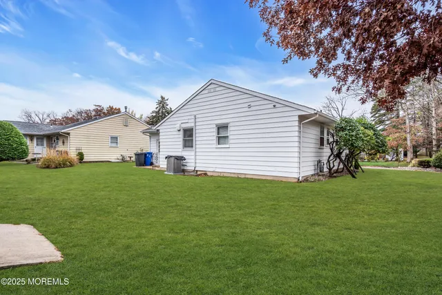 a utility room with closet dryer and washer