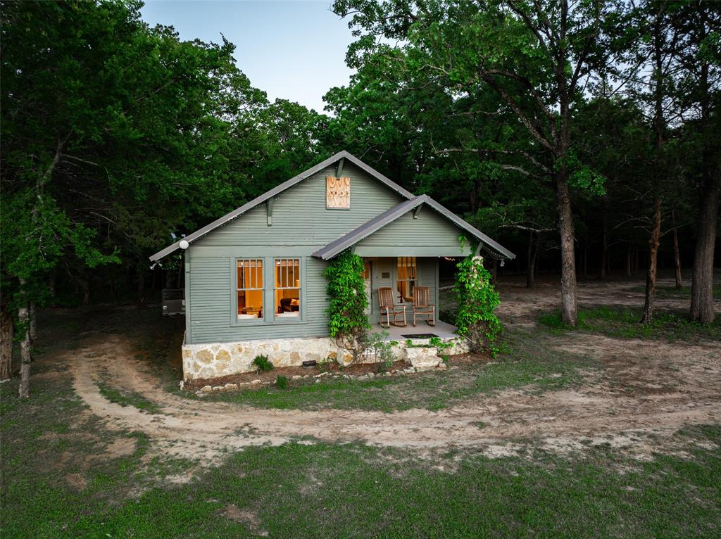 0 County Road 2402 Canton, TX 75103 - Photo 25 of 36 a front view of a house with garden