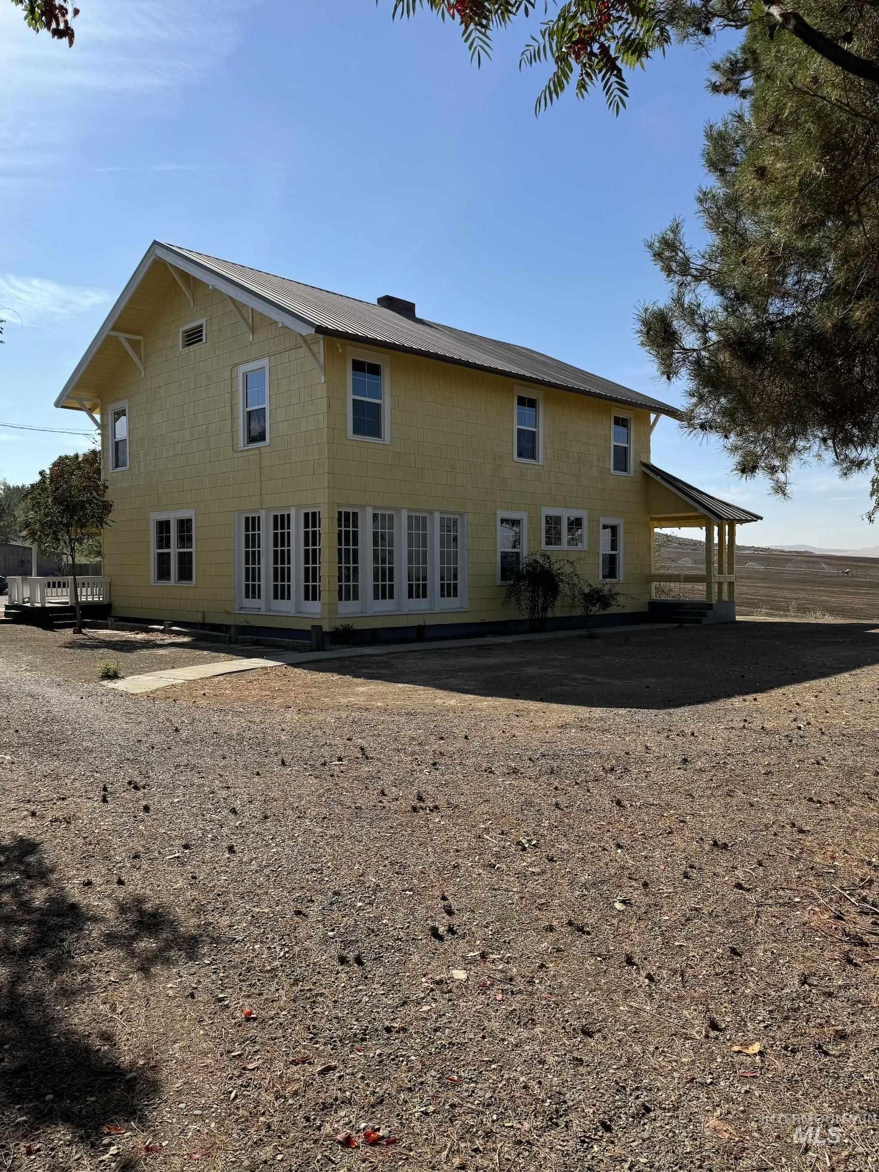 729 Morgan Avenue Ontario, OR 97914 - Photo 9 of 49 Rear view of house with a chimney