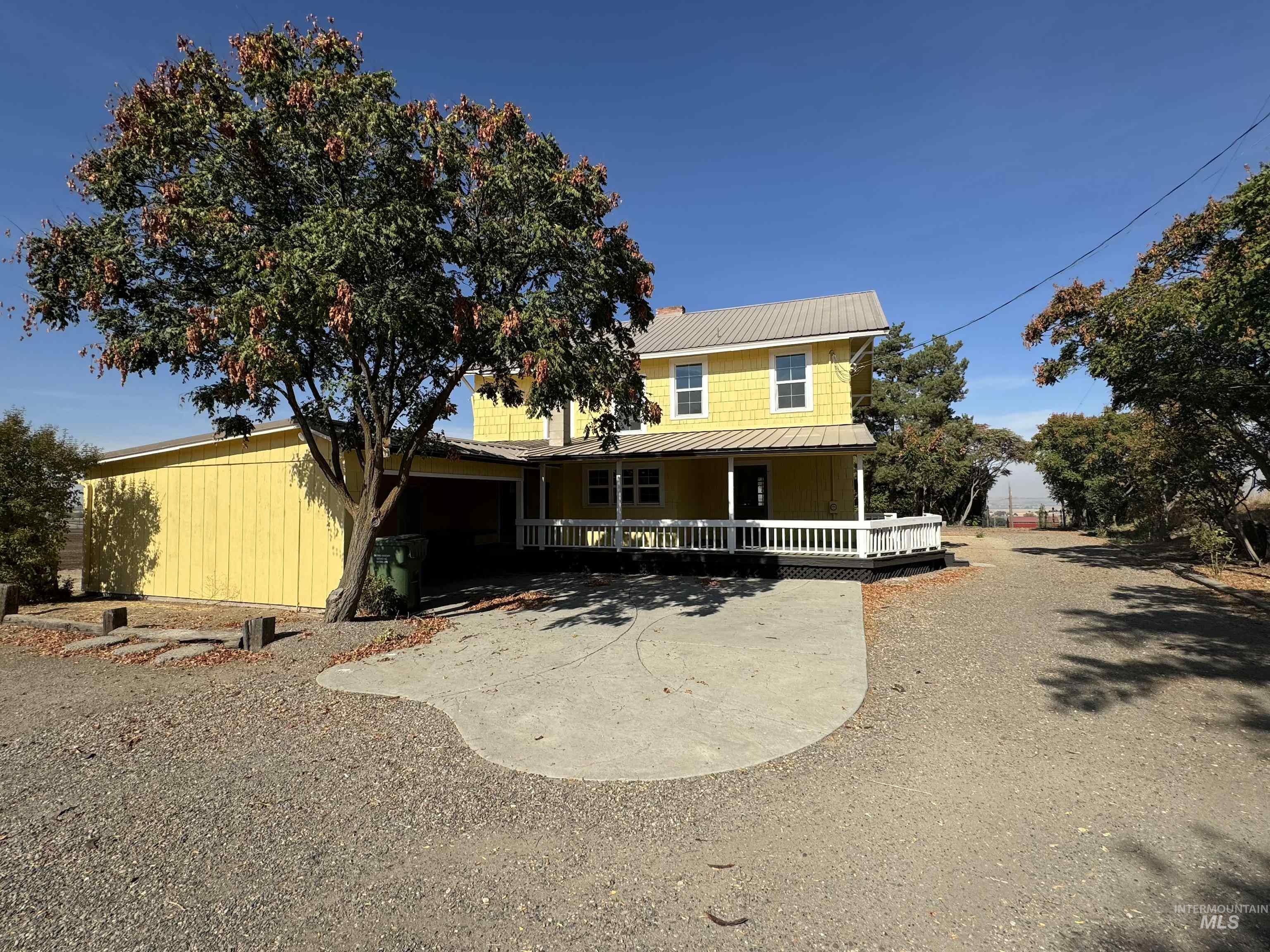 729 Morgan Avenue Ontario, OR 97914 - Photo 10 of 49 Farmhouse inspired home featuring a porch and a metal roof