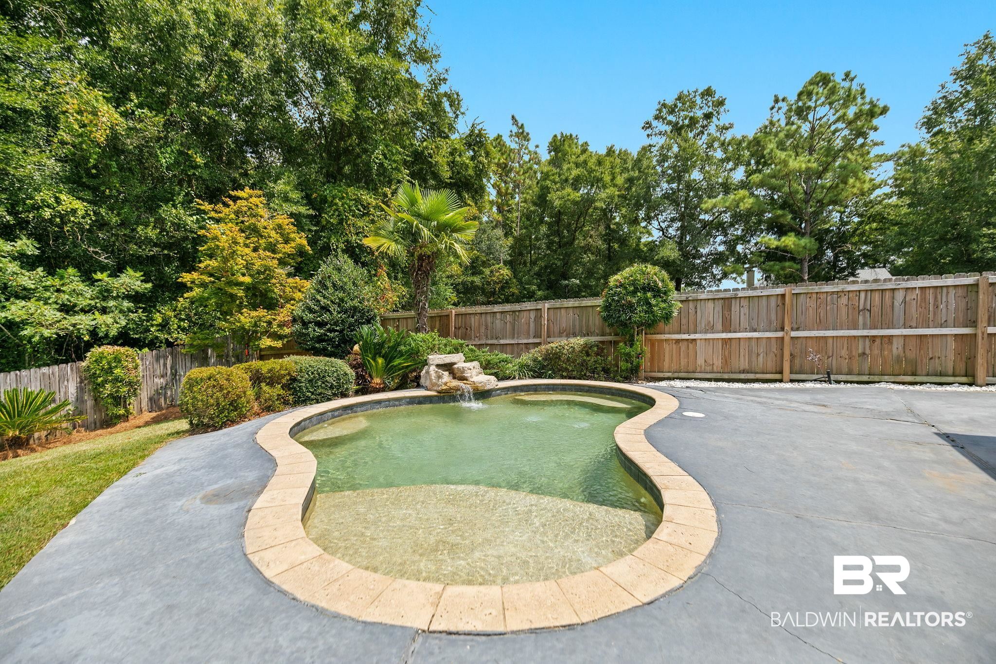 28246 Turkey Branch Drive Daphne, AL 36526 - Photo 33 of 41 View of pool with a patio area and pool water feature