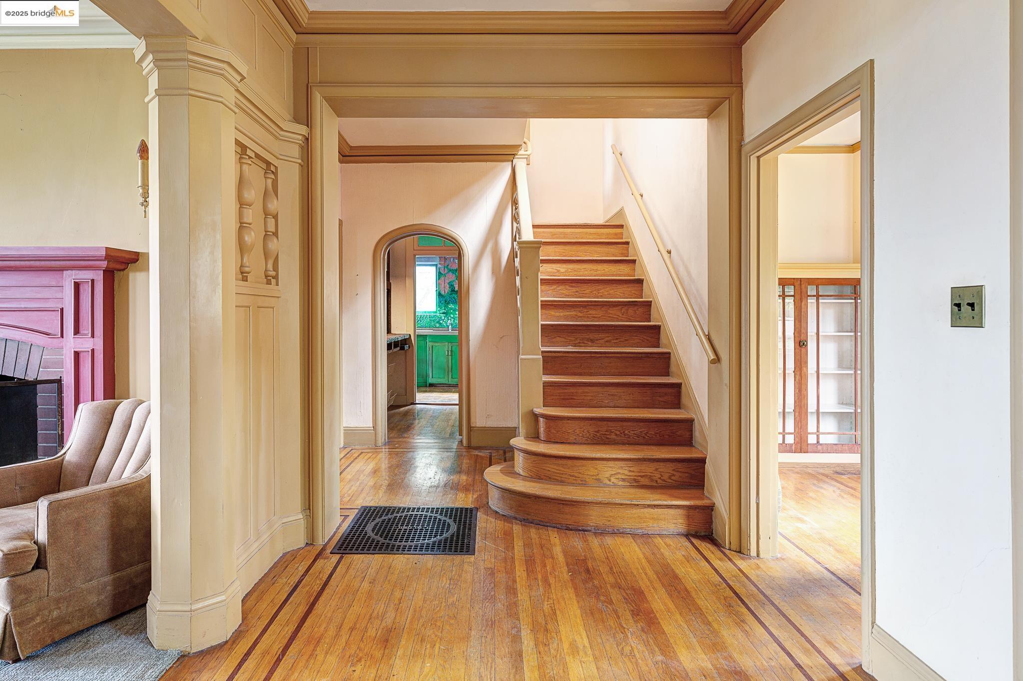 1542 Hawthorne Terrace Berkeley, CA 94708 - Photo 15 of 26 a view of a hallway with wooden floor and staircase