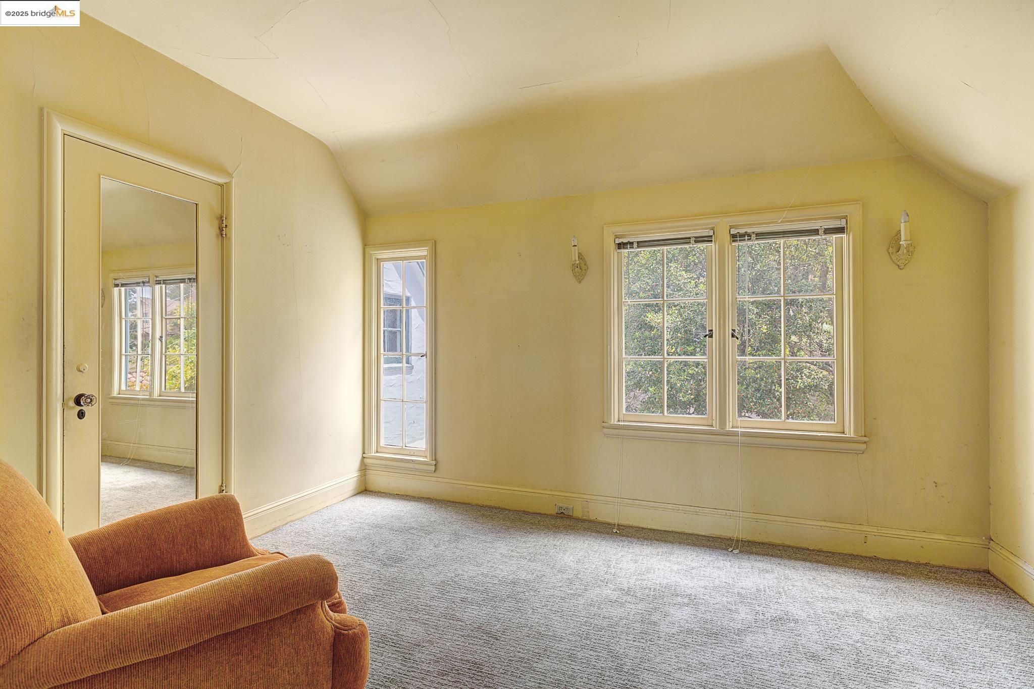 1542 Hawthorne Terrace Berkeley, CA 94708 - Photo 17 of 26 a living room with furniture and a window