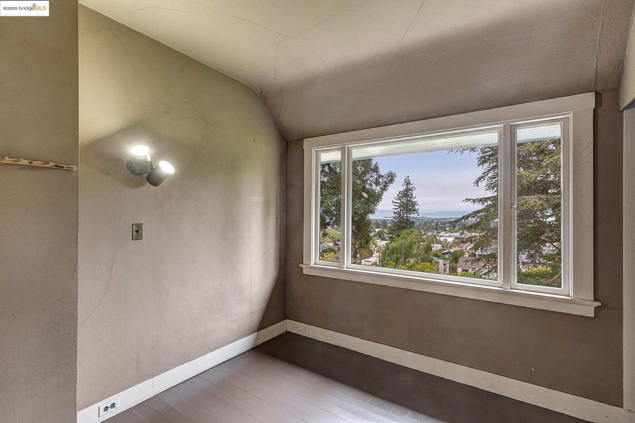1542 Hawthorne Terrace Berkeley, CA 94708 - Photo 19 of 26 a view of room with window and ceiling fan