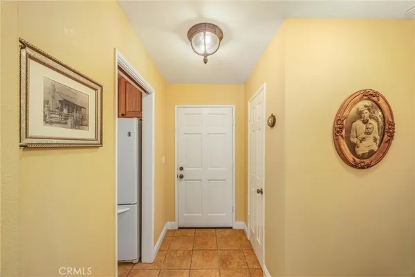 a view of a hallway with elevator