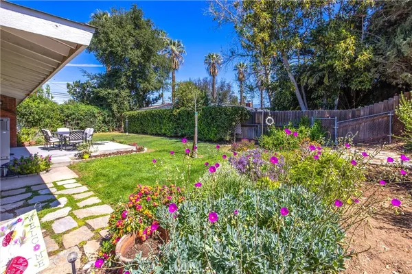 a view of a garden with flowers