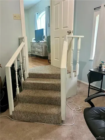 view of living room with furniture and large window
