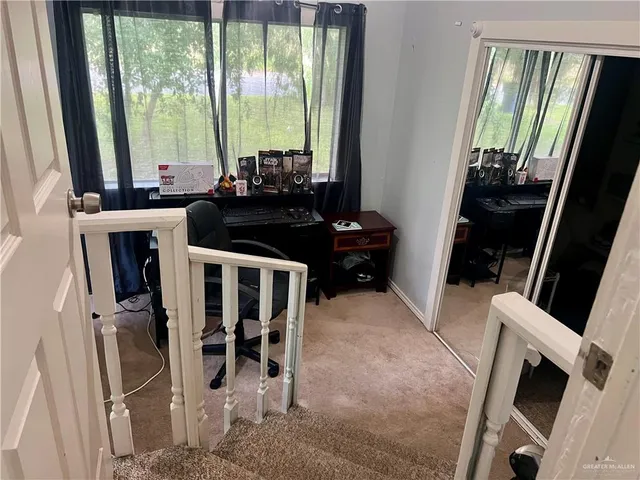 a room with lots of different colored cloths