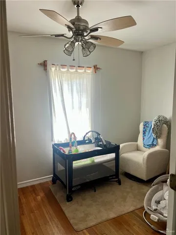 a room with toys and wooden floor