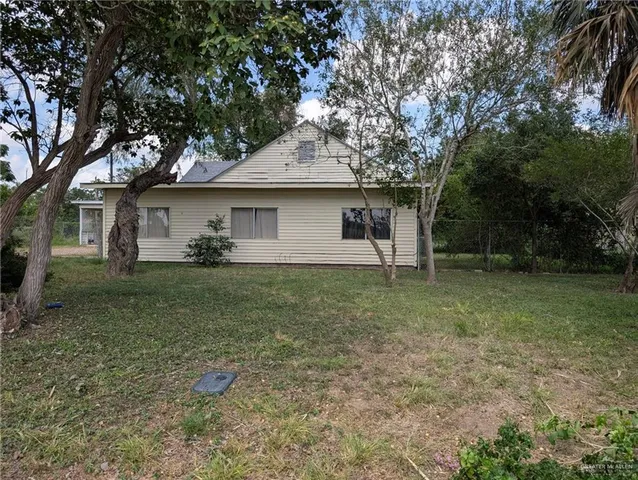 a kitchen with stainless steel appliances a refrigerator and cabinets