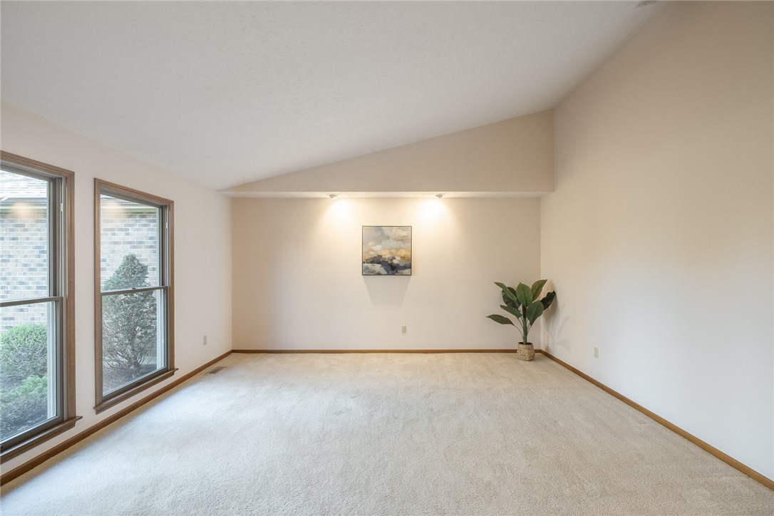276 South Fairfield Road Bellbrook, OH 45305 - Photo 3 of 38 This bright room features vaulted ceilings and ample natural light, creating an inviting atmosphere.