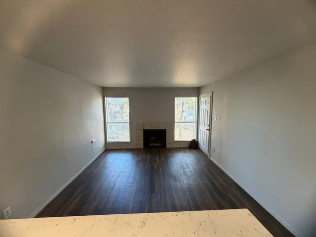 a view interior of a house with wooden floor and a window