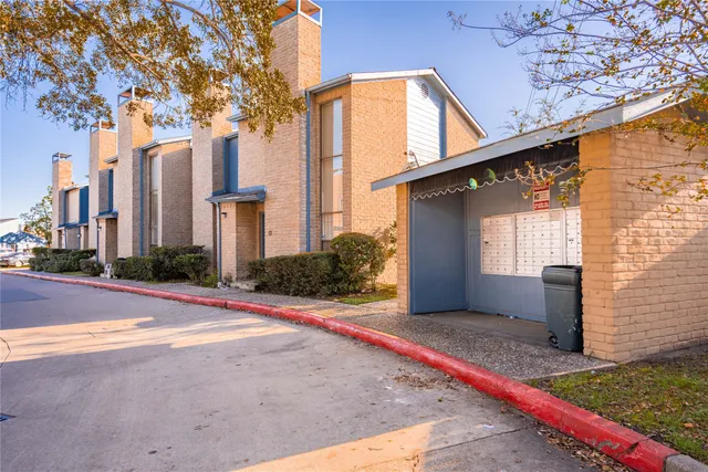 a view of a house with a street