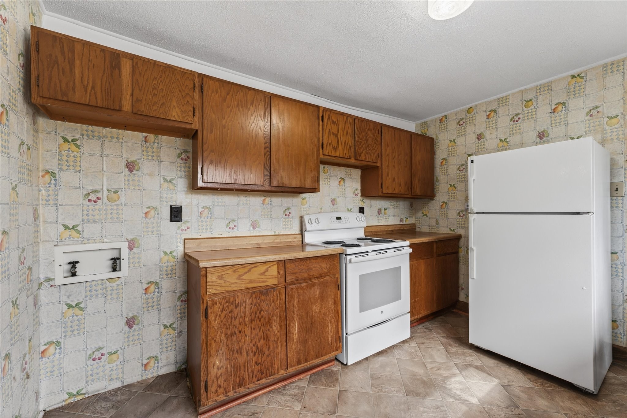 3236 Dover Road Woodlawn, TN 37191 - Photo 12 of 38 a kitchen with stainless steel appliances granite countertop a refrigerator stove a sink and dishwasher