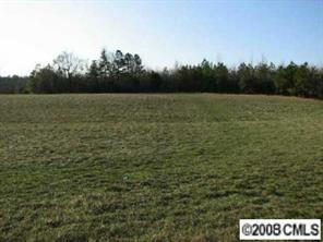 0 Cameron Road Wadesboro, NC 28170 - Photo 8 of 8 a view of a field with trees in the background