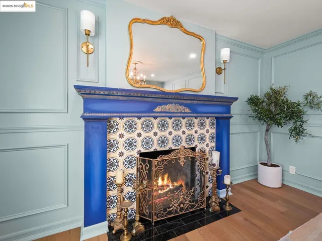 a room with fireplace and wooden floor