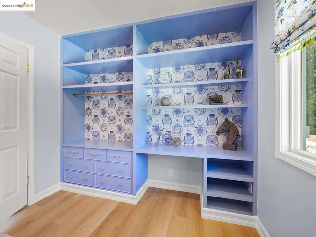 a bathroom with a bathtub sink and mirror