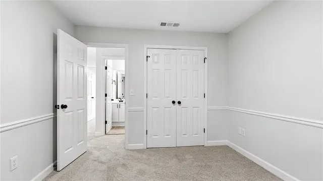 a bathroom with a sink double vanity granite toilet tub and shower