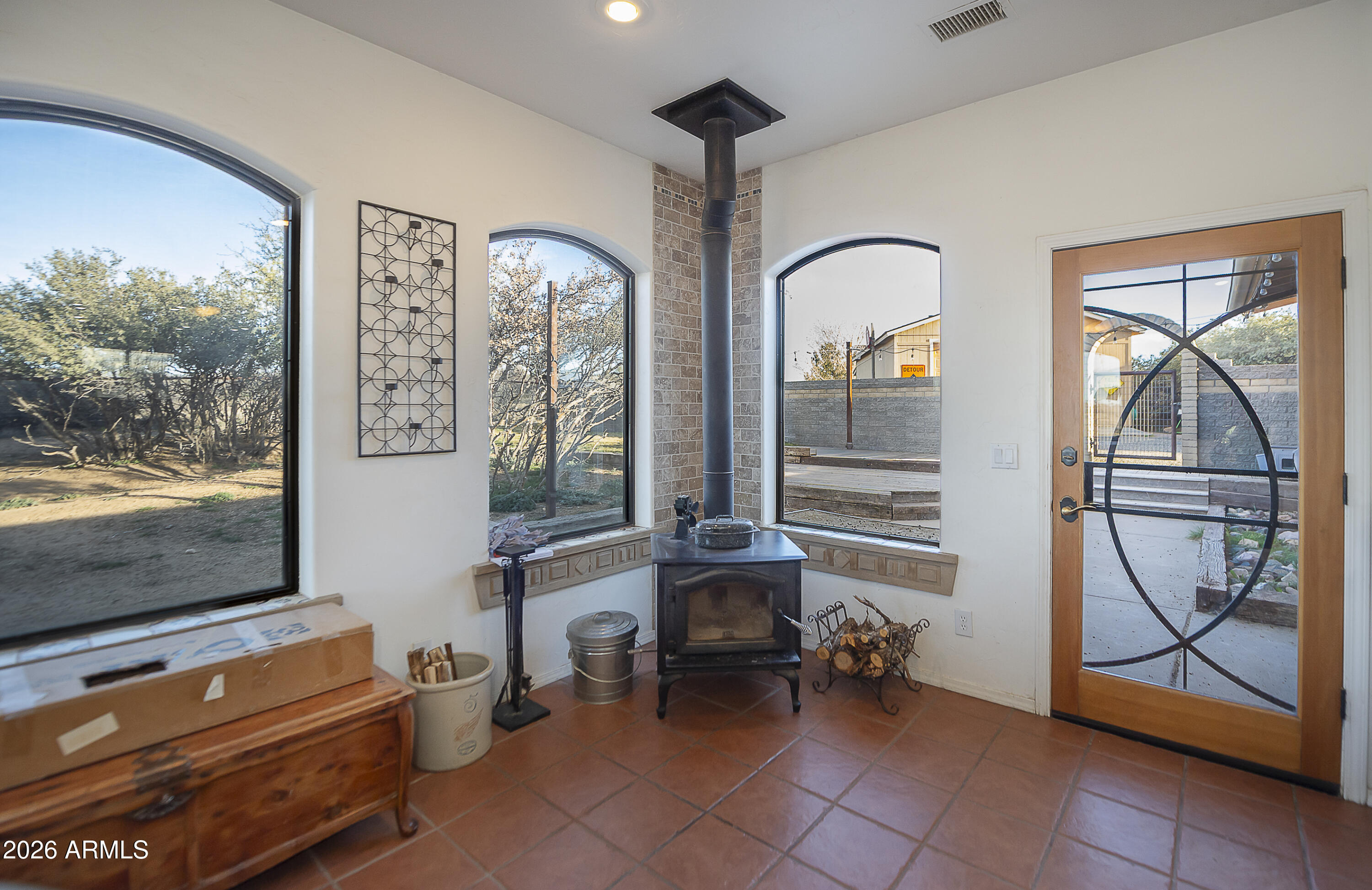 6565 Musgrove Road Skull Valley, AZ 86338 - Photo 18 of 67 a room with multiple dryer and windows