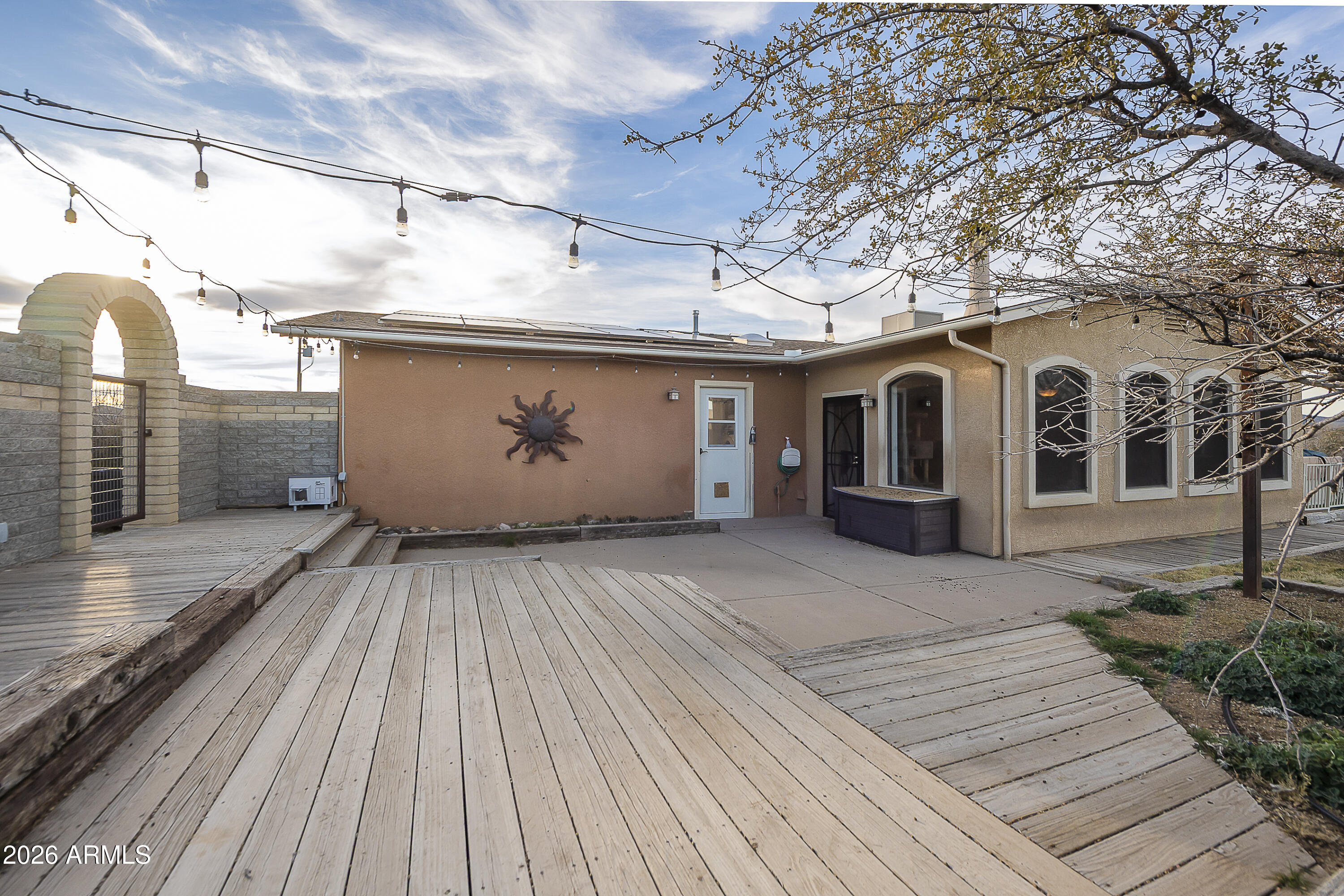 6565 Musgrove Road Skull Valley, AZ 86338 - Photo 38 of 67 a view of a house with a wooden roof