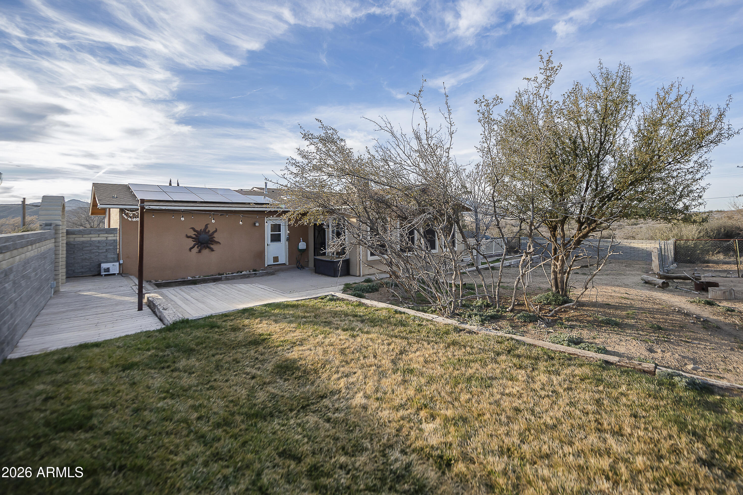 6565 Musgrove Road Skull Valley, AZ 86338 - Photo 40 of 67 a view of a backyard with a garden