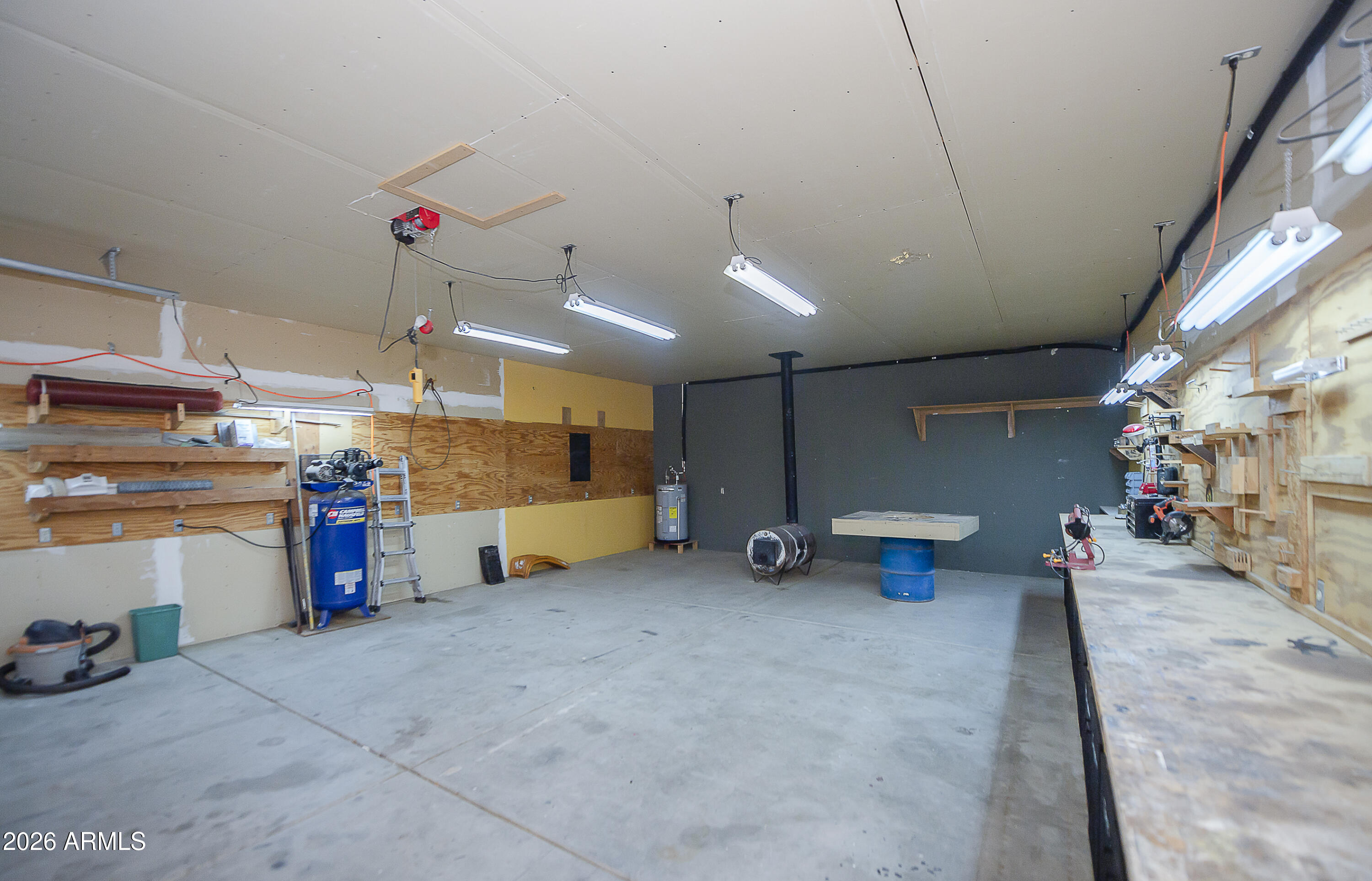 6565 Musgrove Road Skull Valley, AZ 86338 - Photo 47 of 67 a view of a garage with furniture