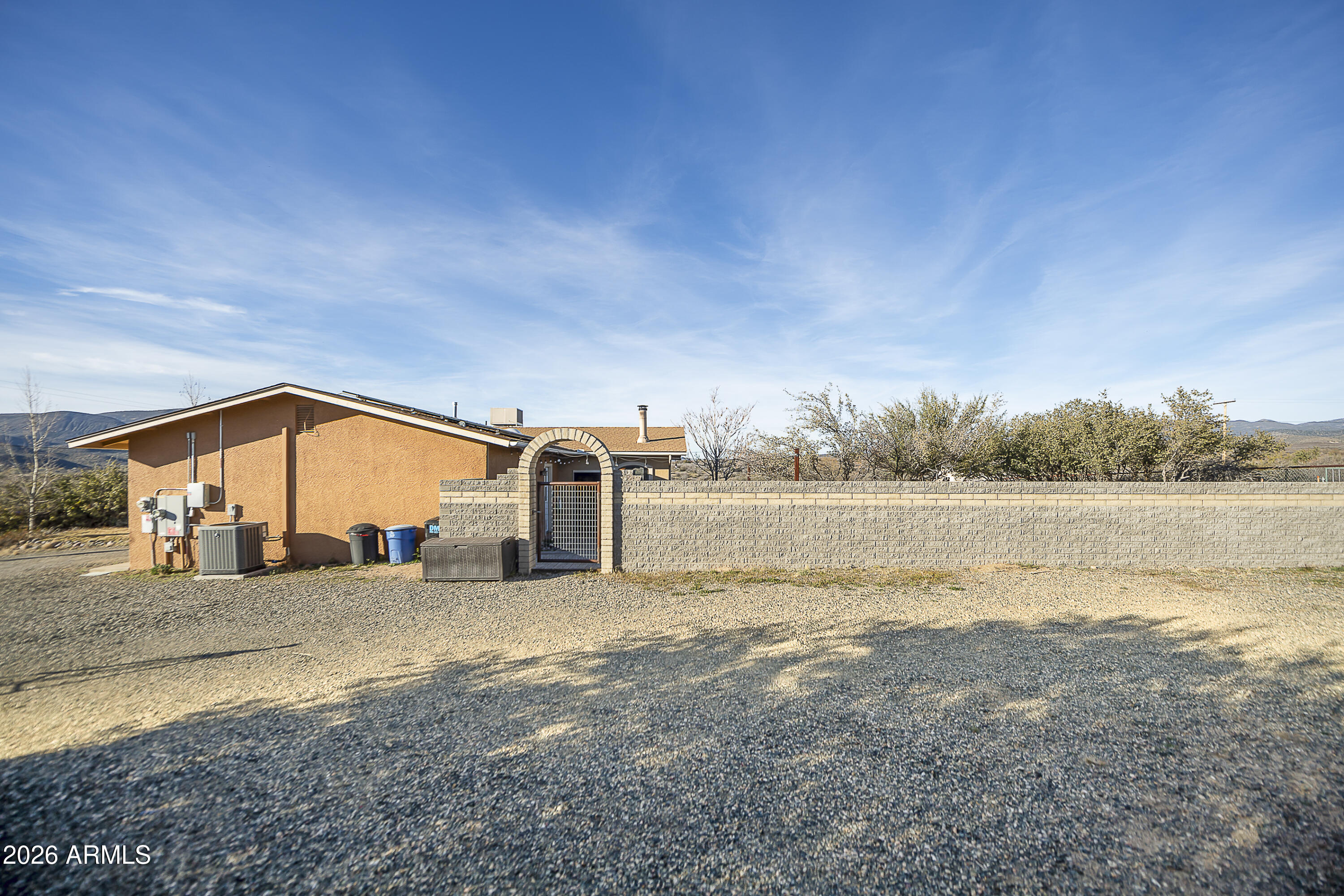 6565 Musgrove Road Skull Valley, AZ 86338 - Photo 63 of 67 a view of a lake with an outdoor space