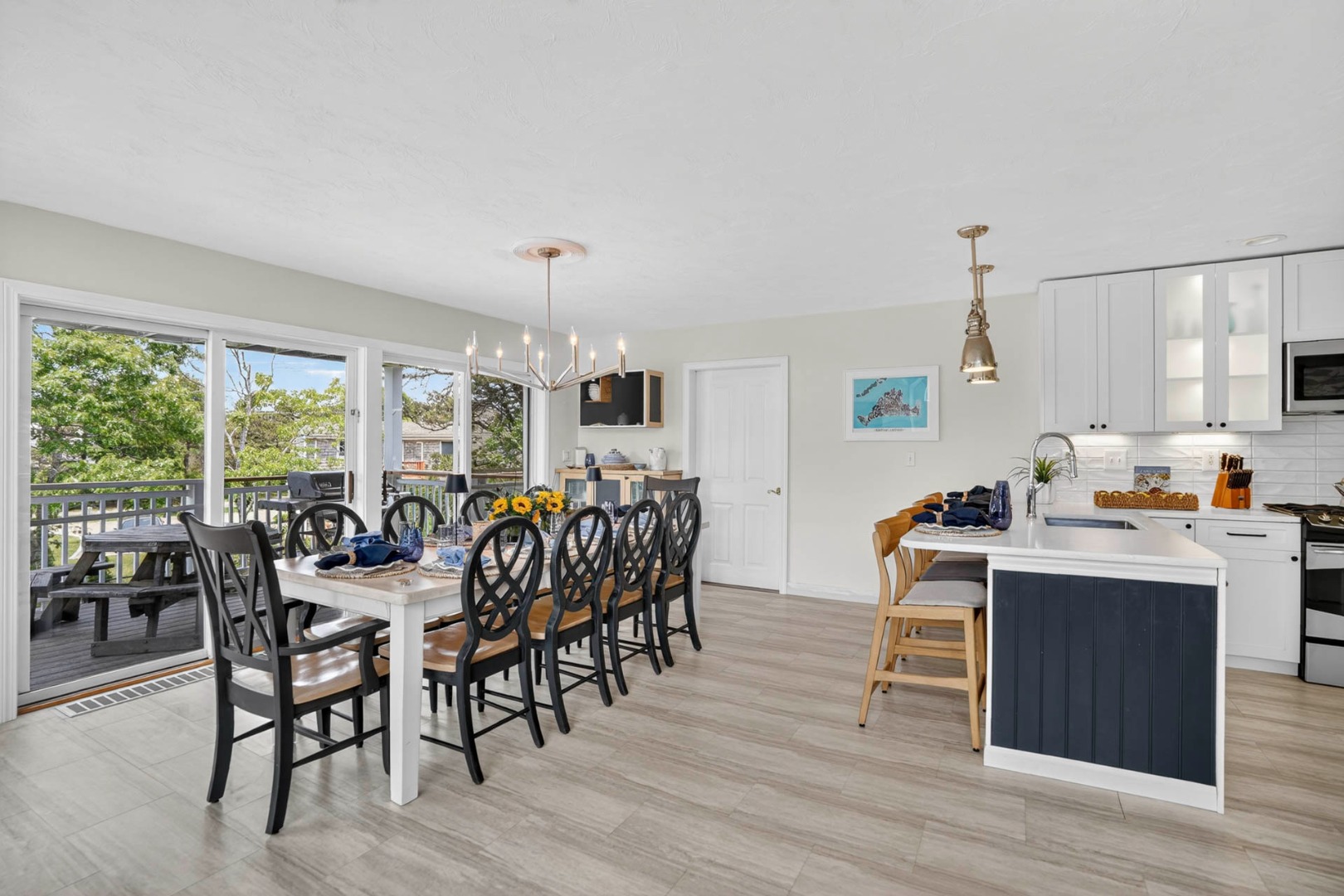 9 Thaxter Lane Edgartown, MA 02539 - Photo 10 of 53 a view of a dining room with furniture window and outside view