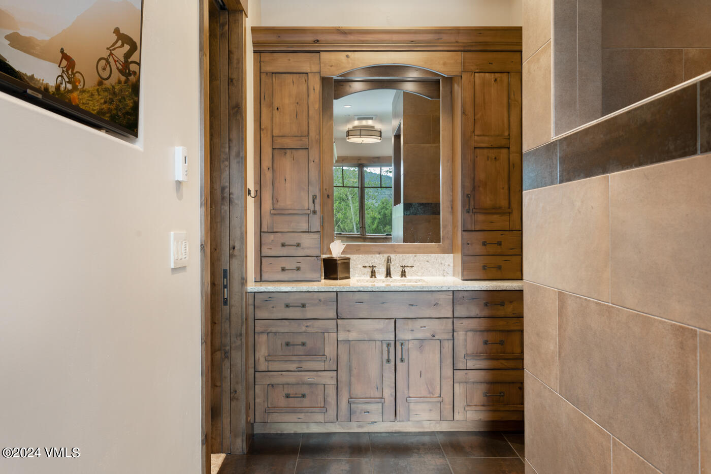 1288 East Haystacker Drive Eagle, CO 81631 - Photo 12 of 34 a bathroom with a double vanity sink and mirror