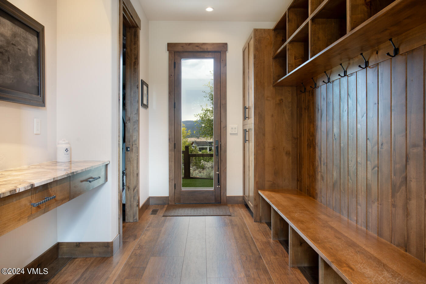 1288 East Haystacker Drive Eagle, CO 81631 - Photo 33 of 34 a view of hallway with wooden floor and staircase