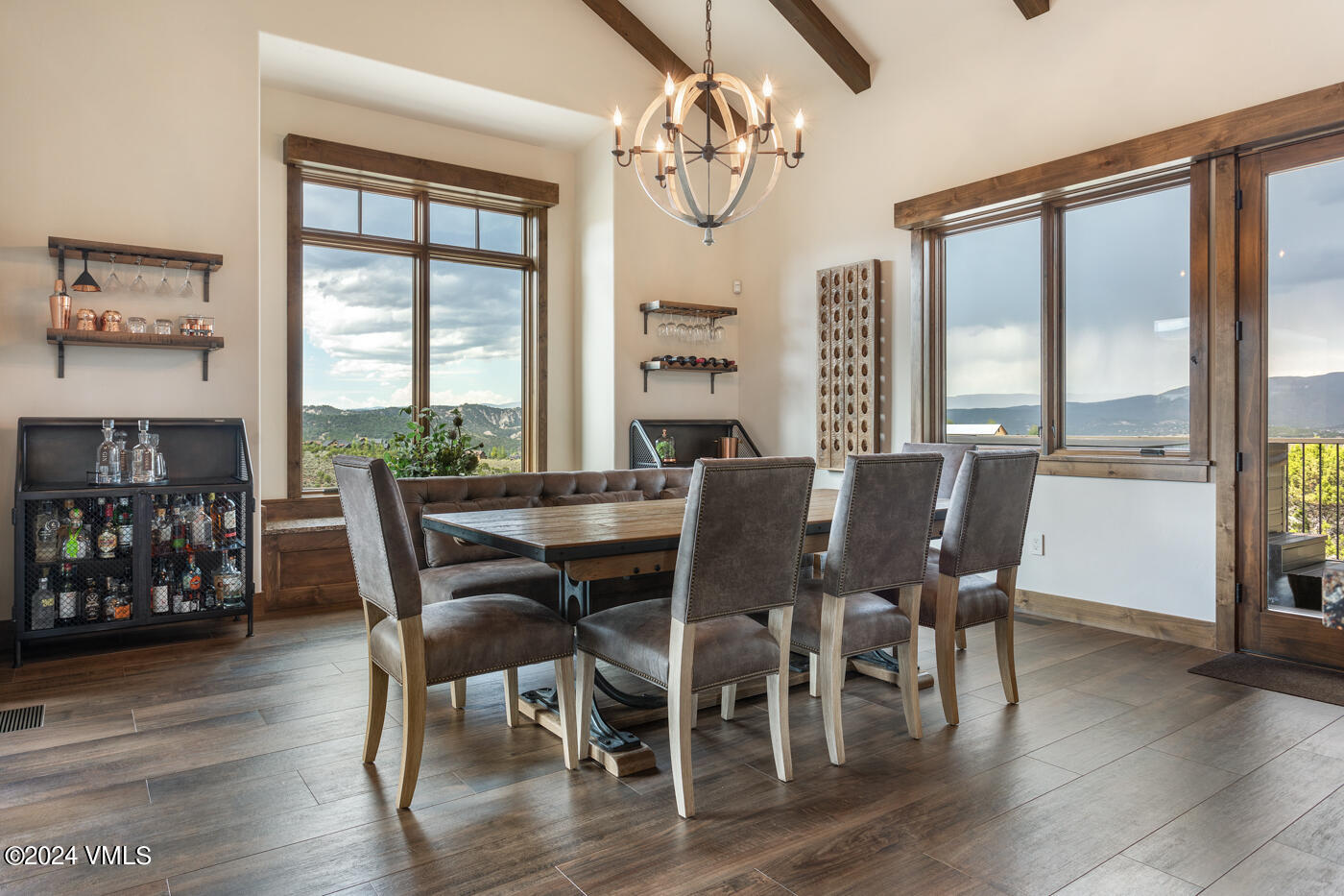 1288 East Haystacker Drive Eagle, CO 81631 - Photo 8 of 34 a view of a dining room with furniture window and wooden floor
