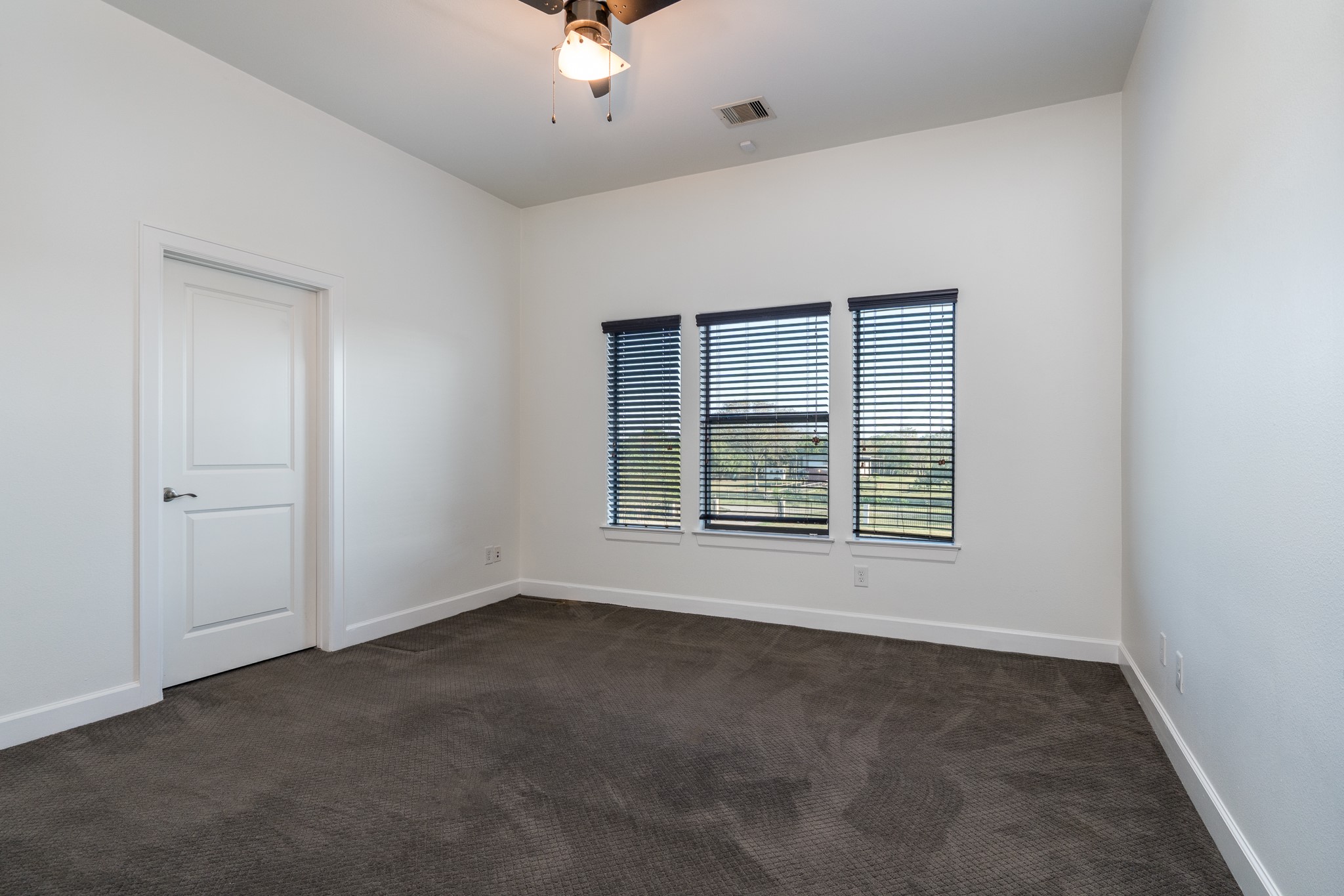 12748 Roy Road Pearland, TX 77581 - Photo 47 of 50 Second bedroom up - rest easy knowing there's a recent AC and a whole home generator installed 2022.