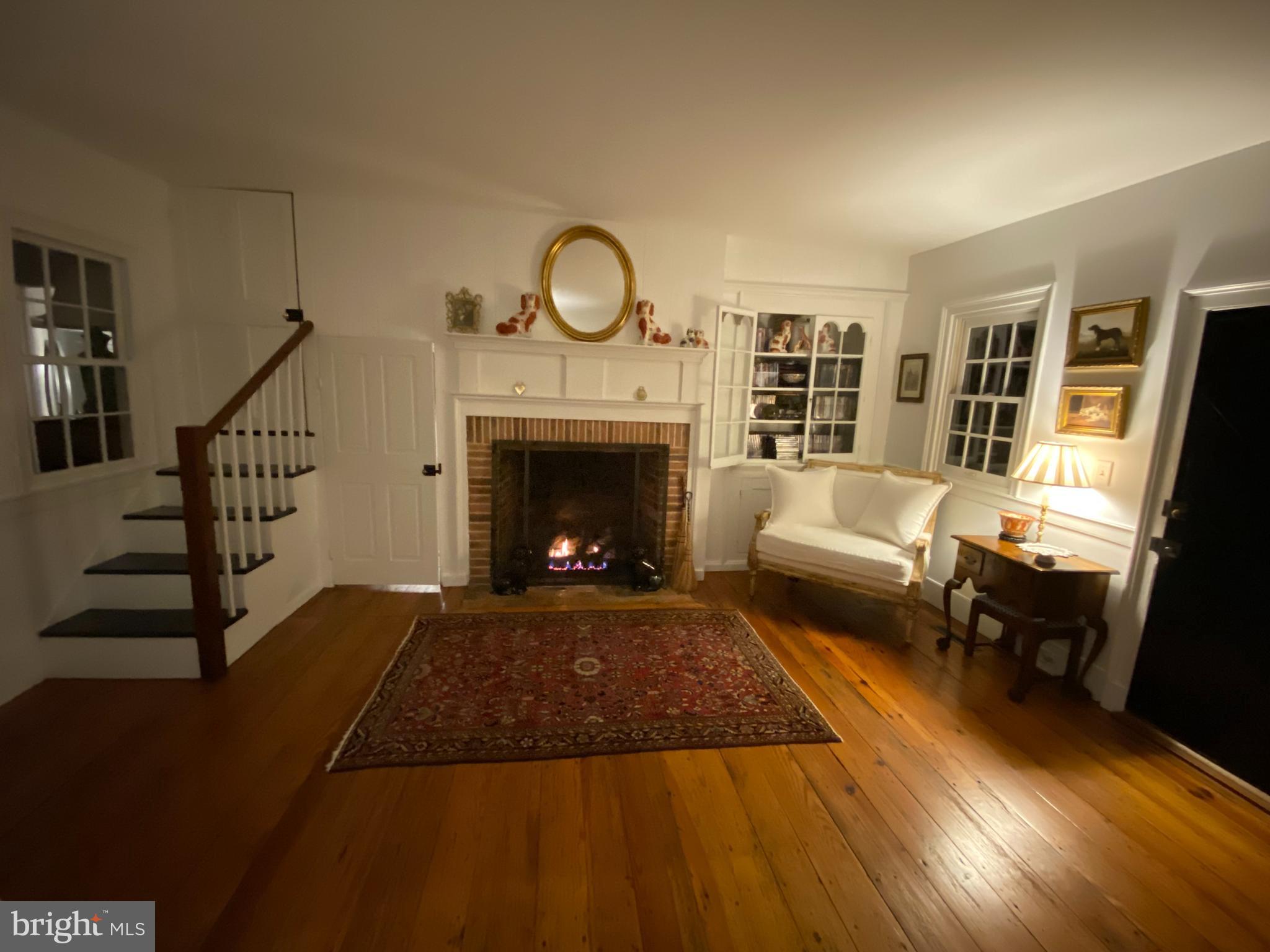10230 John Carvill Road Chestertown, MD 21620 - Photo 12 of 41 a living room with furniture and a fireplace