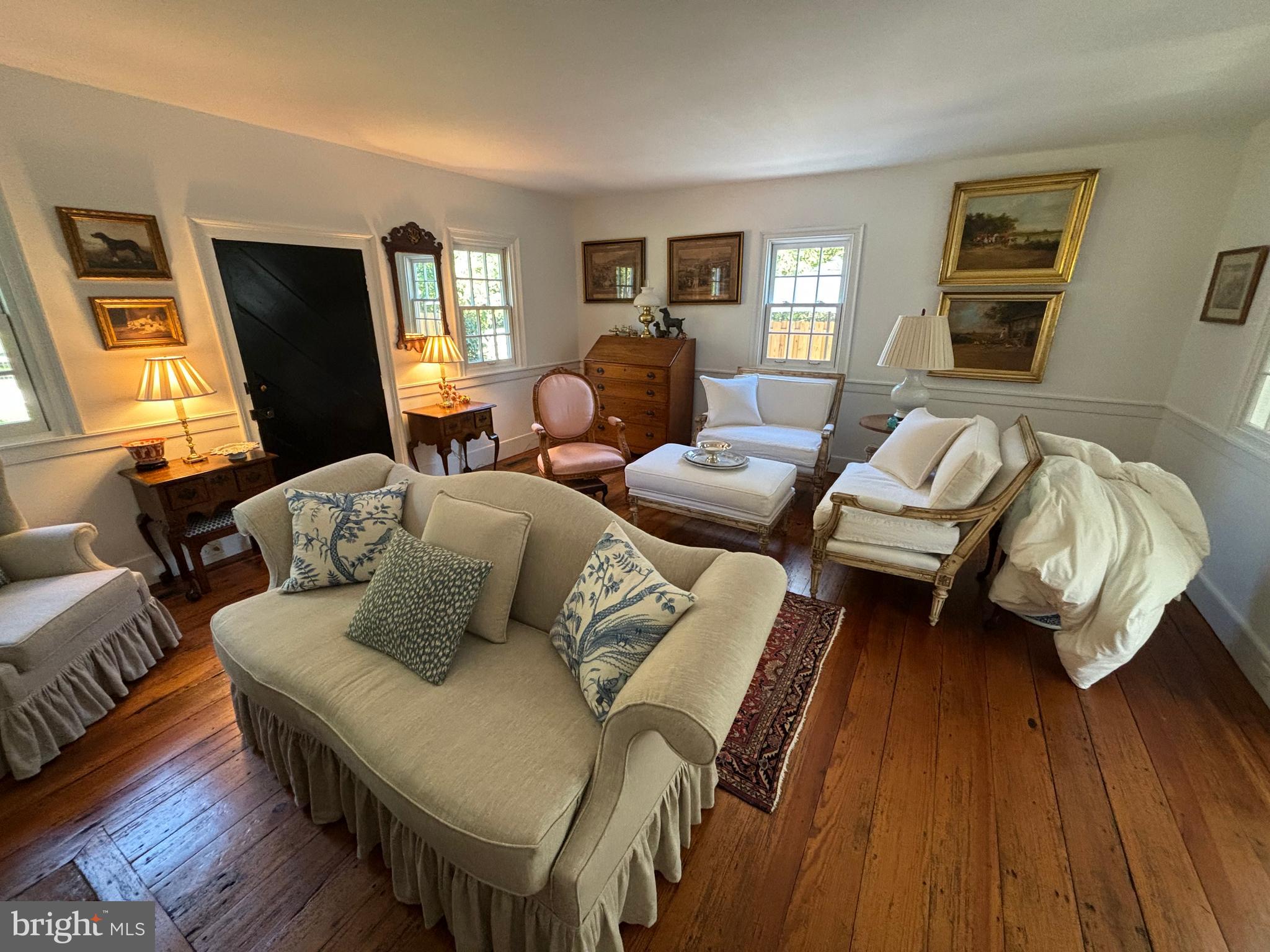 10230 John Carvill Road Chestertown, MD 21620 - Photo 13 of 41 a bedroom with furniture and wooden floor