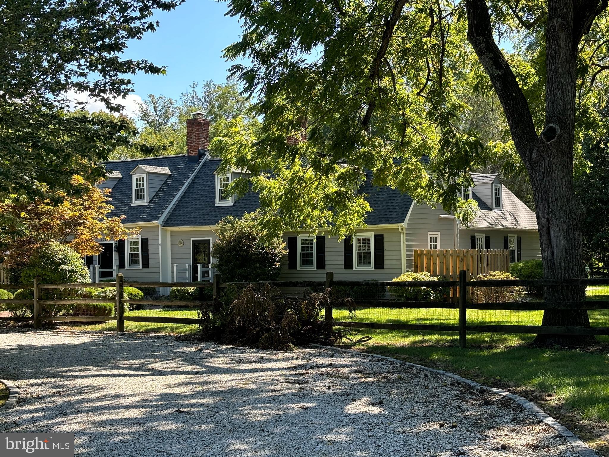 10230 John Carvill Road Chestertown, MD 21620 - Photo 2 of 41 a view of a house with a big yard plants and large trees