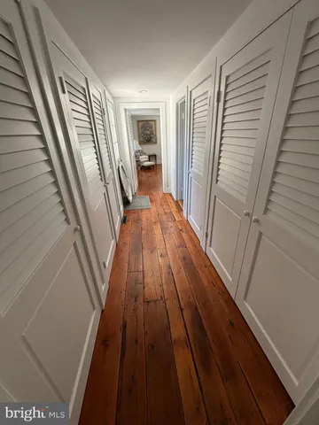 a view of balcony with wooden floor