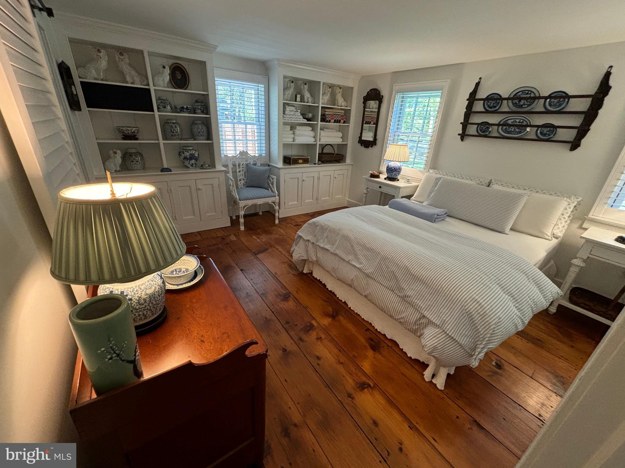 10230 John Carvill Road Chestertown, MD 21620 - Photo 25 of 41 a bedroom with furniture and a wooden floor