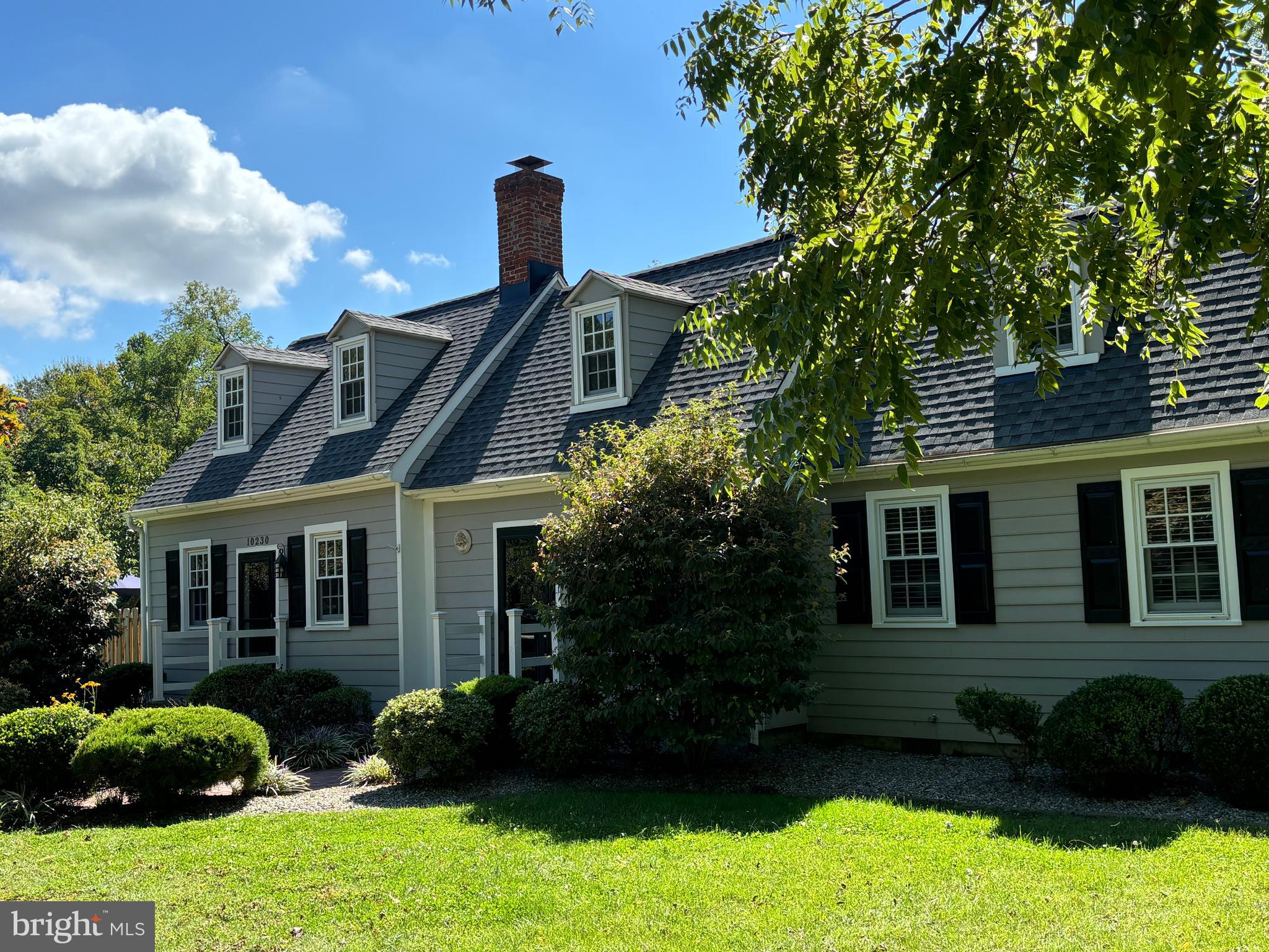10230 John Carvill Road Chestertown, MD 21620 - Photo 31 of 41 a front view of a house with a garden