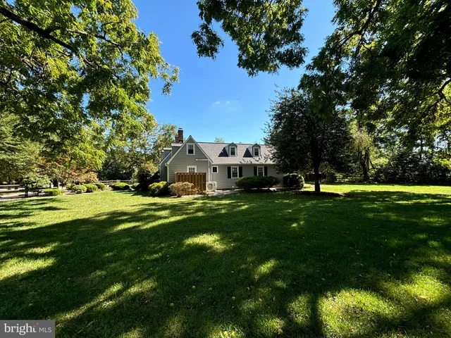 a view of a house with a big yard