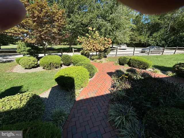 a view of a lake with a yard