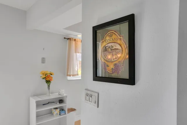 a view of front door with wooden floor