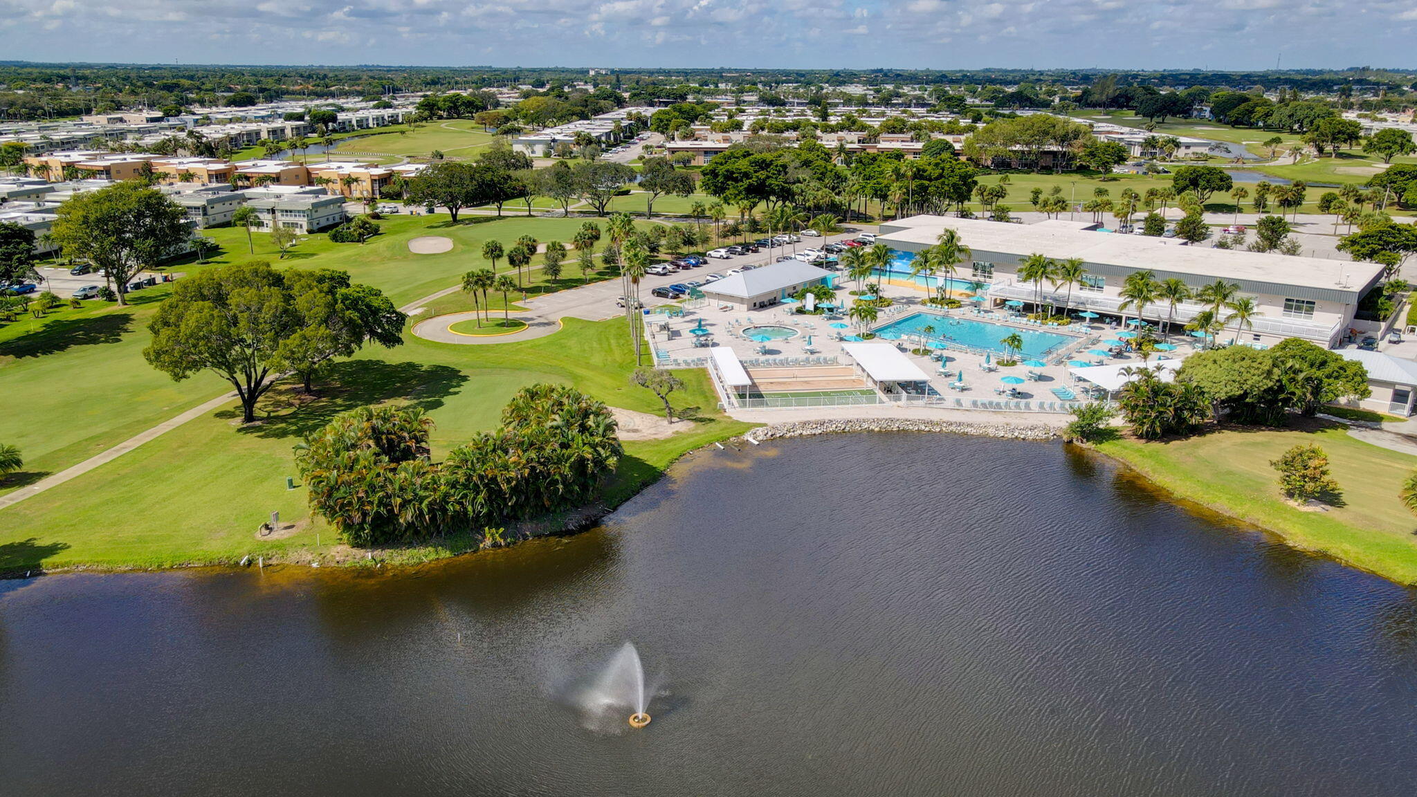 152 Tuscany Lane, Unit C Delray Beach, FL 33446 - Photo 31 of 40 a view of a lake with a city view