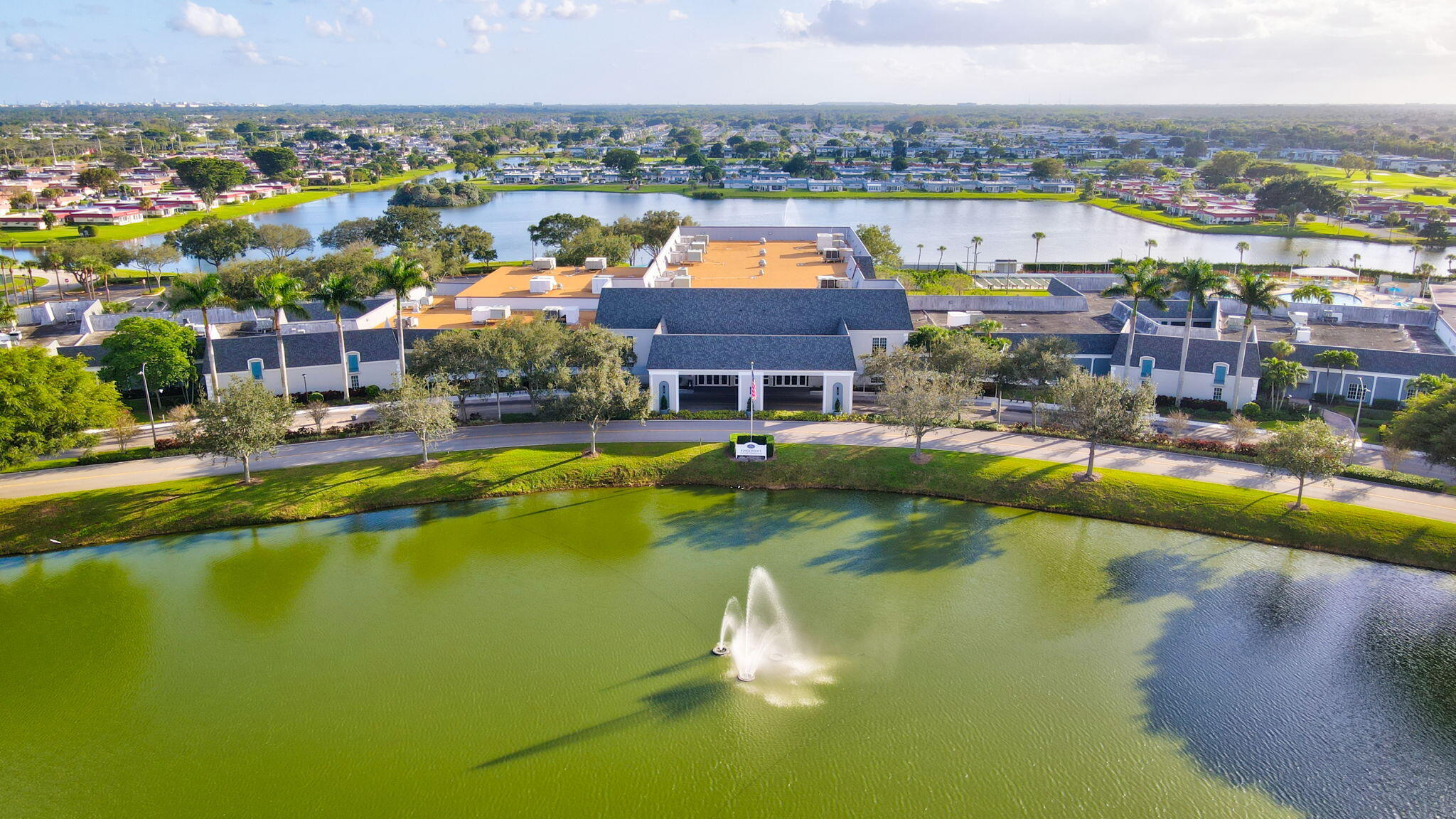 152 Tuscany Lane, Unit C Delray Beach, FL 33446 - Photo 33 of 40 a view of a city with lawn chairs