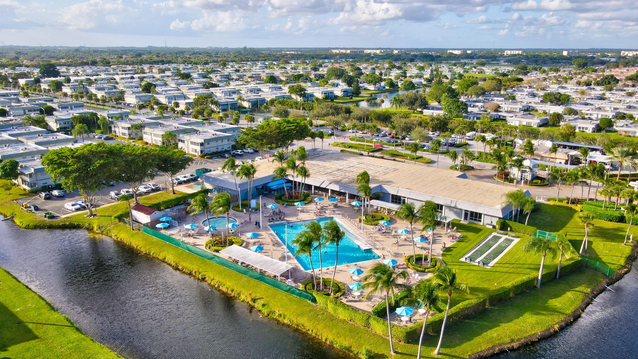 152 Tuscany Lane, Unit C Delray Beach, FL 33446 - Photo 36 of 40 an aerial view of a residential houses with outdoor space