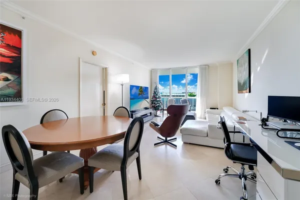 a workspace with a table and chairs