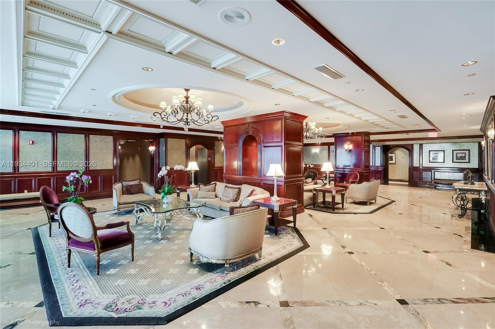 9559 Collins Avenue, Unit S5F Surfside, FL 33154 - Photo 22 of 27 a living room with furniture and a large window