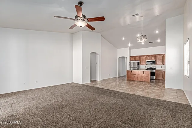 a view of a livingroom with a ceiling fan